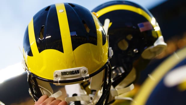 Scenes from a Michigan Wolverines game during the college football season in the Big Ten.